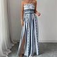 👗 50% OFF NOW! 💥 Geometric Jumpsuit with Halter Neckline & Side Slit – Unique print & elastic back – Versatile, perfect for summer parties or resort wear ✨