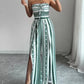 👗 50% OFF NOW! 💥 Geometric Jumpsuit with Halter Neckline & Side Slit – Unique print & elastic back – Versatile, perfect for summer parties or resort wear ✨