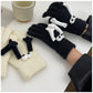 Hand holding gloves warm winter magnetic gloves