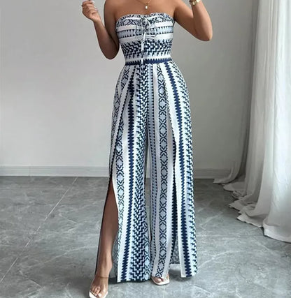 👗 50% OFF NOW! 💥 Geometric Jumpsuit with Halter Neckline & Side Slit – Unique print & elastic back – Versatile, perfect for summer parties or resort wear ✨