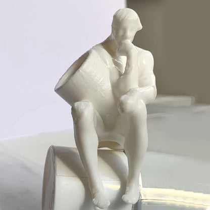The Thinker Pooping Toothpaste Cap