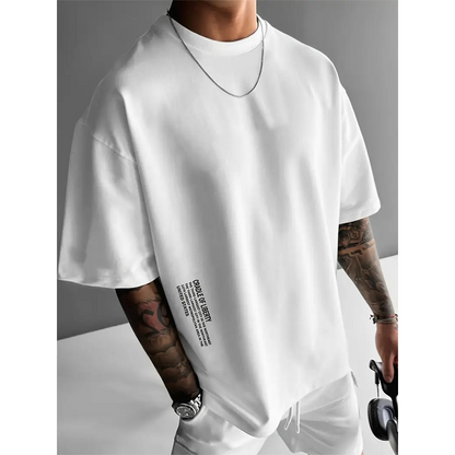 👕 57% OFF NOW! ✨ Men's Loose Fit Short Sleeve Shirt – Premium Cotton Blend, Urban Graphic Print & Oversized Casual Style🏙️